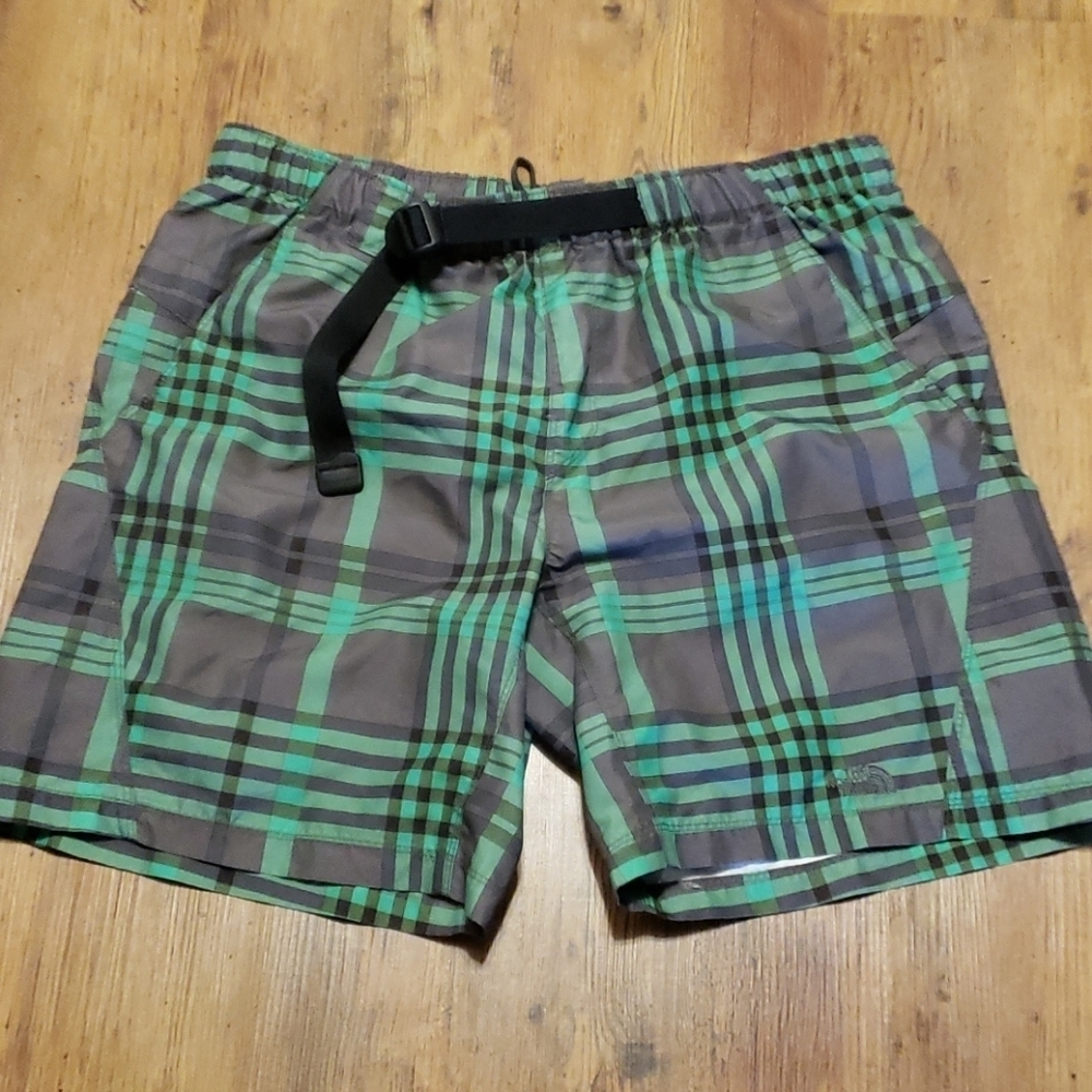 The north face green and gray lined swim trunks